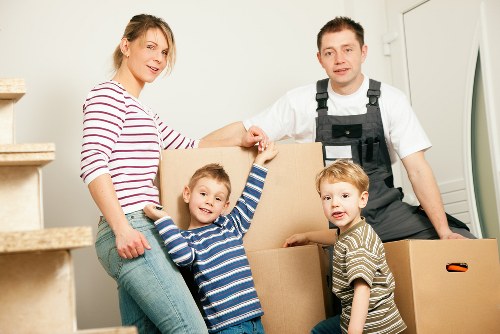 Packed belongings ready for transport in a Kew removals van