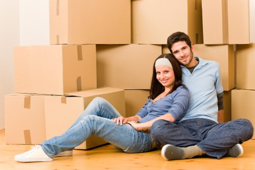 Local moving team preparing furniture for transport in Kew