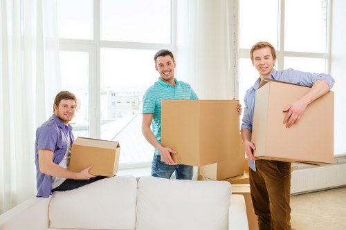 Commercial removal service moving office furniture and equipment near Kew