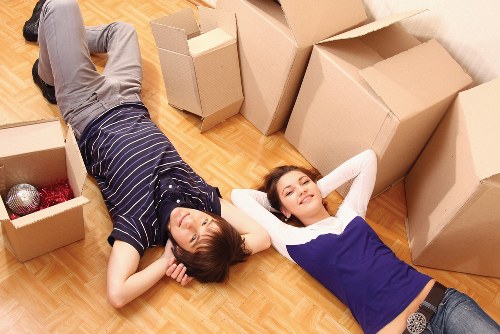 Collection of sofas, tables, and office furniture in Kew