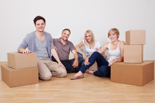Packed boxes and wrapped furniture ready for a Kew house move