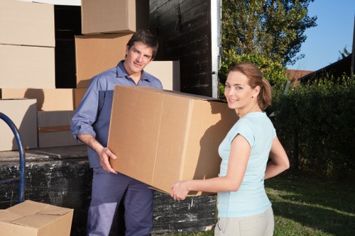 Local removal team managing boxes and furniture for a Kew relocation