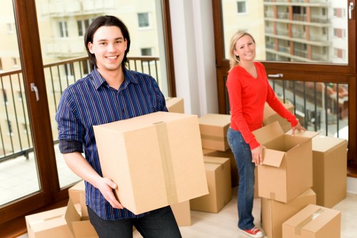 Packing office furniture and equipment for relocation in Kew