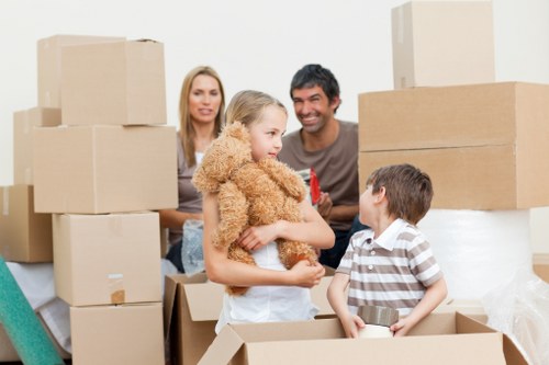 Unpacking service helping a family settle into a Kew property